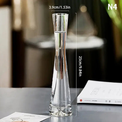 Clear glass flower vase with slender elegant design and flared top by DecorBites for luxury home decor
