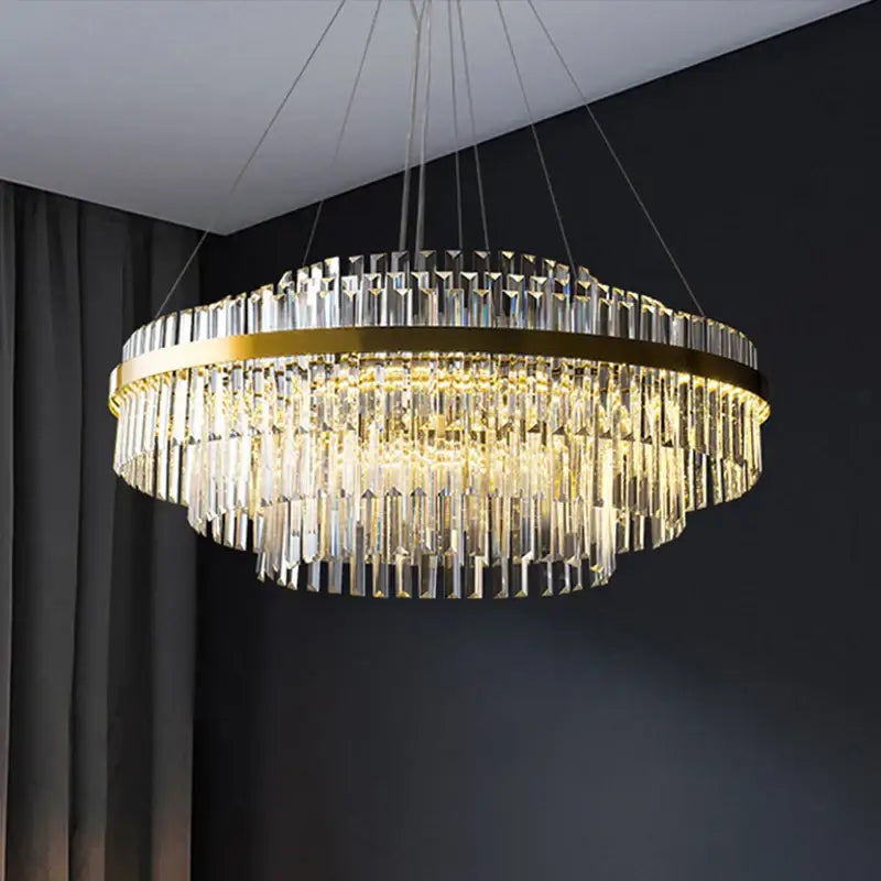 A modern decorbites™ luxury led crystal chandelier with clear prisms and gold metal frame for home decor