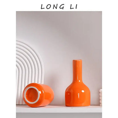 DecorBites luxury modern ceramic vase in vibrant orange with sleek glossy finish and slender neck for elegant decor
