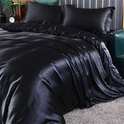 Decorbites luxury mulberry silk duvet cover bedding set in black satin with glossy finish and elegant ruffled edges