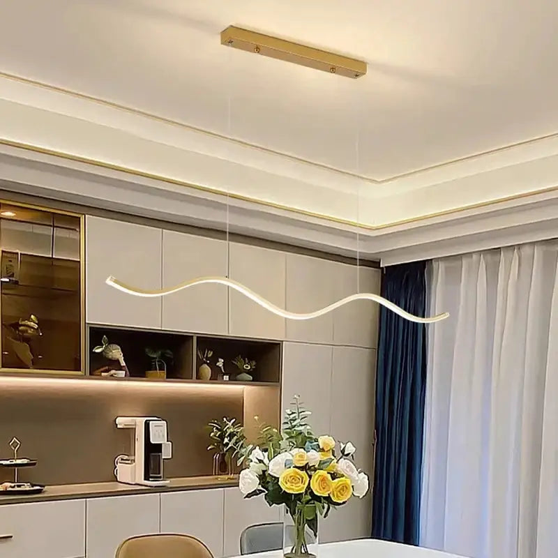 A sleek luxury nordic chandelier with smooth curved design and warm white led for dining room lighting