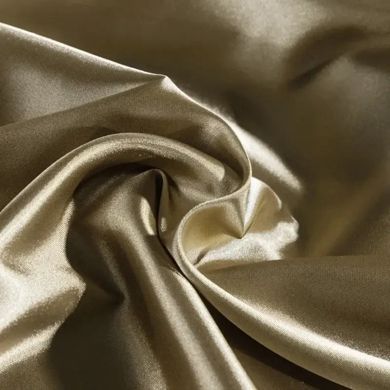 Luxurious gold satin duvet cover with smooth glossy finish and subtle sheen from decorbites luxury nordic silk bedding set