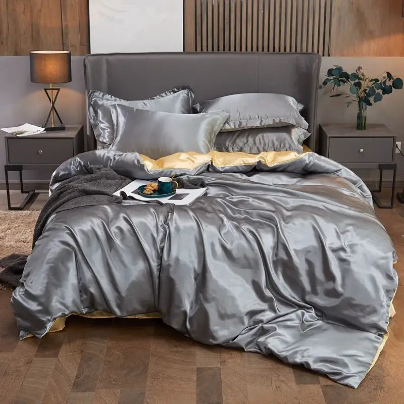 Luxurious silver rayon satin pcduvet cover set with gold inner lining and matching pillows for twin queen king width bed
