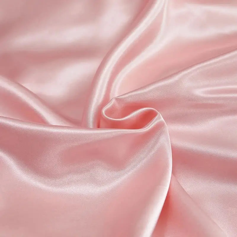 Soft blush pink rayon satin fabric with smooth glossy finish and gentle folds for decorbites luxury pcduvet cover bedding set