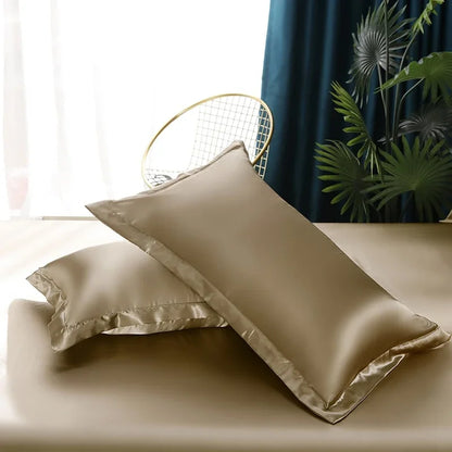 Beige satin pillowcases with subtle sheen and stitched edges from decorbites luxury silk duvet cover and bed sheet set