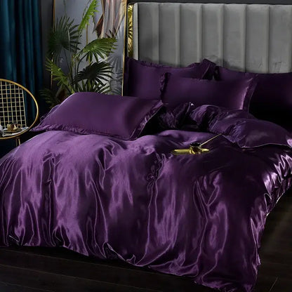 Decorbites luxury silk bedding set with deep purple satin duvet cover and matching pillows on tufted headboard