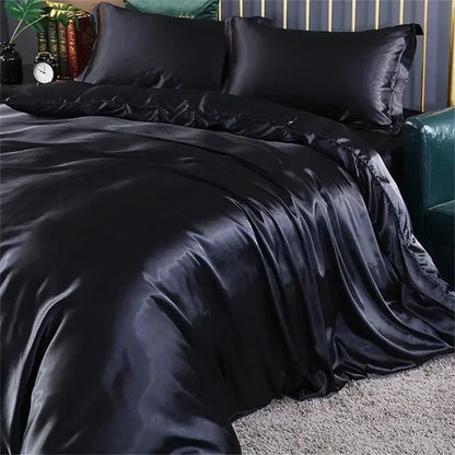Black satin duvet cover and bedding set with fitted sheet featuring glossy finish and elegant ruffled edges by DecorBites™