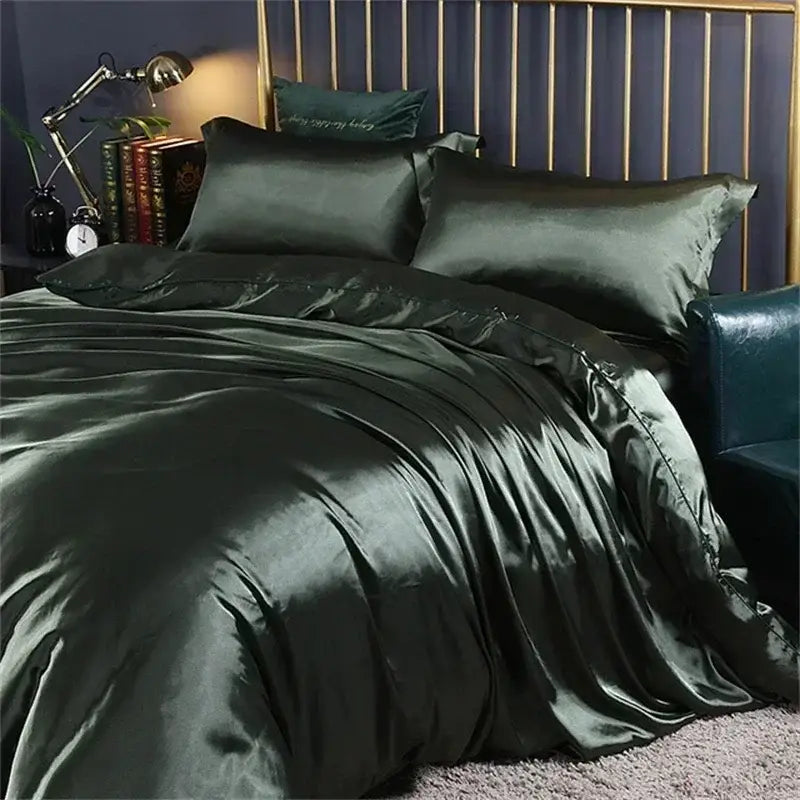 Dark green satin decorbites luxury silk bedding set with duvet cover and fitted sheet featuring smooth glossy texture