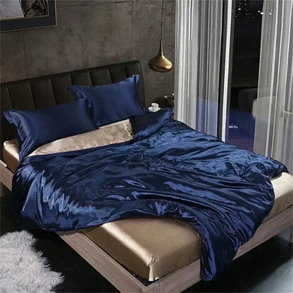 Deep blue satin duvet cover bedding set with fitted sheet and gold-trimmed inner lining by decorbites luxury silk