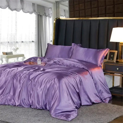 DecorBites™ luxury silk bedding set with lustrous purple satin duvet cover and fitted sheet with elegant draping