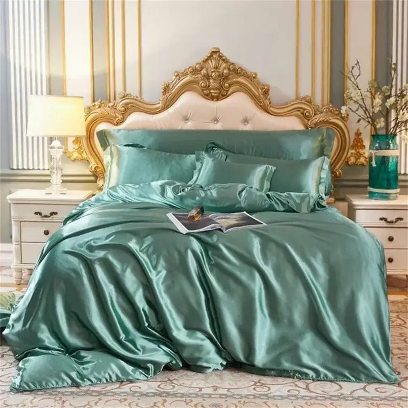 Luxurious teal satin DecorBites™ bedding set with duvet cover and fitted sheet on ornate gold-framed bed