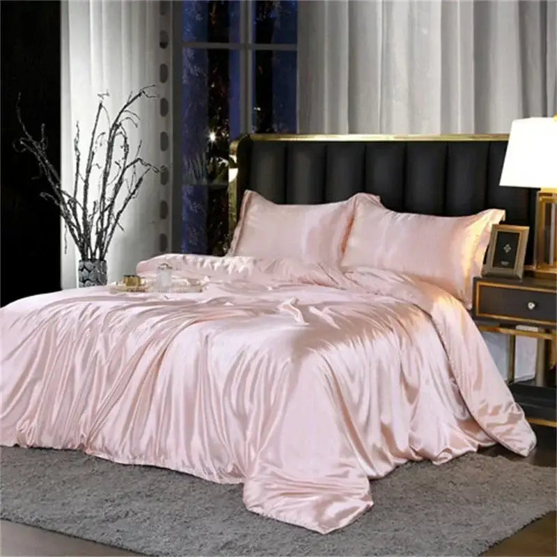Pink satin DecorBites luxury silk bedding set with duvet cover and fitted sheet for queen or king bed with glossy finish