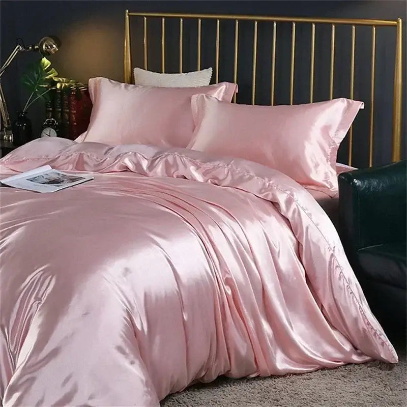 Pink satin DecorBites™ luxury silk bedding set with glossy finish and ruffled edges including duvet cover and fitted sheet