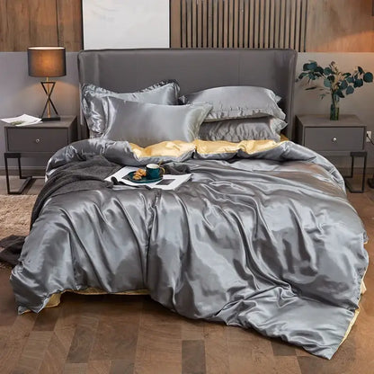 Luxurious silver satin solid color pcduvet cover set with gold inner lining and matching pillows for width bed sizes