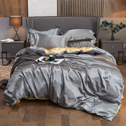 Luxurious DecorBites™ solid color silver satin pcduvet cover set with gold inner lining and matching pillows for width bed