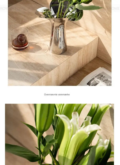 DecorBites™ luxury stainless steel vase in metallic silver with flared rim holding fresh green lily stems for home decor