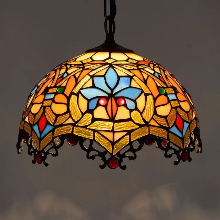 DecorBites luxury Tiffany style stained glass pendant light with vibrant amber blue and gold floral design handcrafted glass pendant