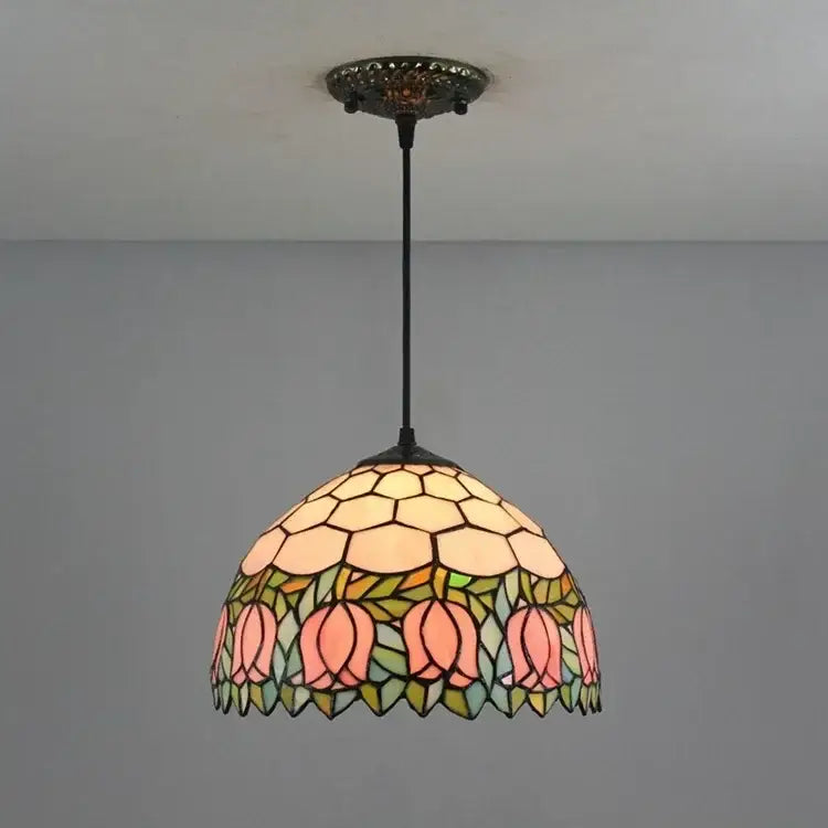Decorbites luxury tiffany style stained glass pendant light in peach with hexagonal floral design suspended by black rod