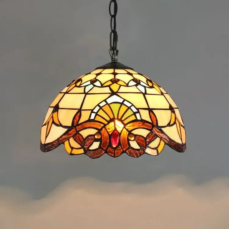 DecorBites™ luxury Tiffany style stained glass pendant light with warm amber floral and fan patterns in glass pendant design