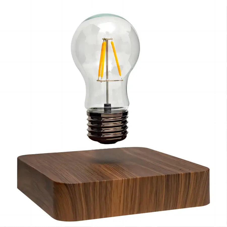 Decorbites™ magnetic levitation lamp with floating clear glass led bulb and warm yellow filament on dark wood base