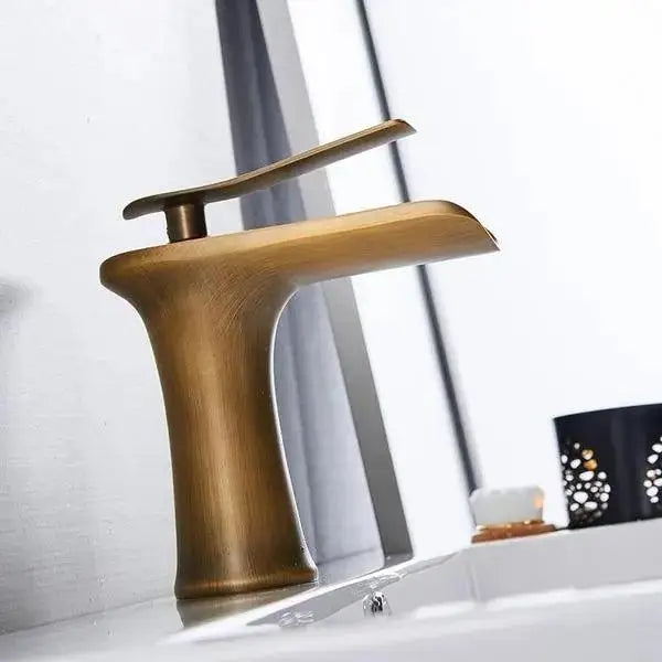 DecorBites™ Mai gold bathroom faucet single handle antique brass finished waterfall with sleek modern design