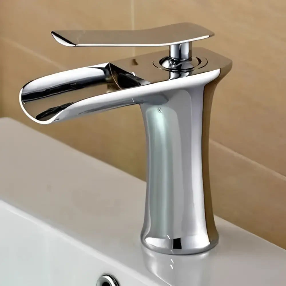 Decorbites™ mai single handle gold bathroom faucet with chrome finish and sleek modern waterfall design