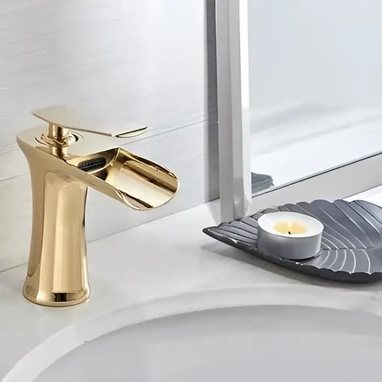 DecorBites Mai single handle gold bathroom faucet with sleek modern design and waterfall spout