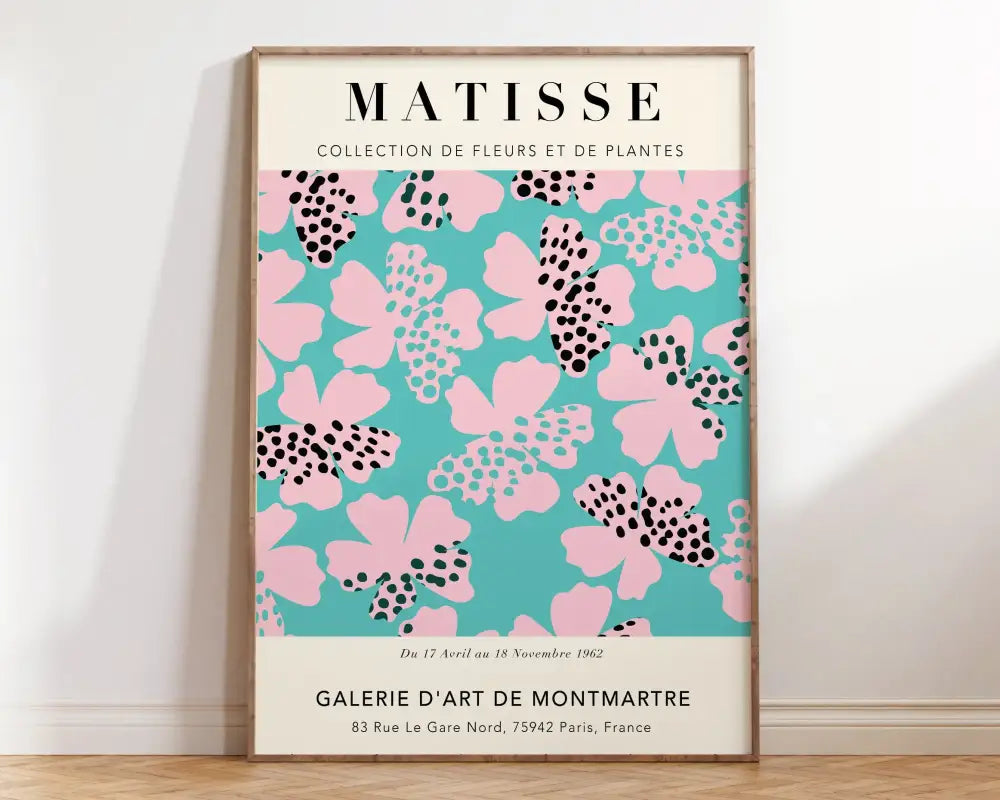 A framed matisse floral art print with turquoise background and pink polka dot flowers from decorbites collection