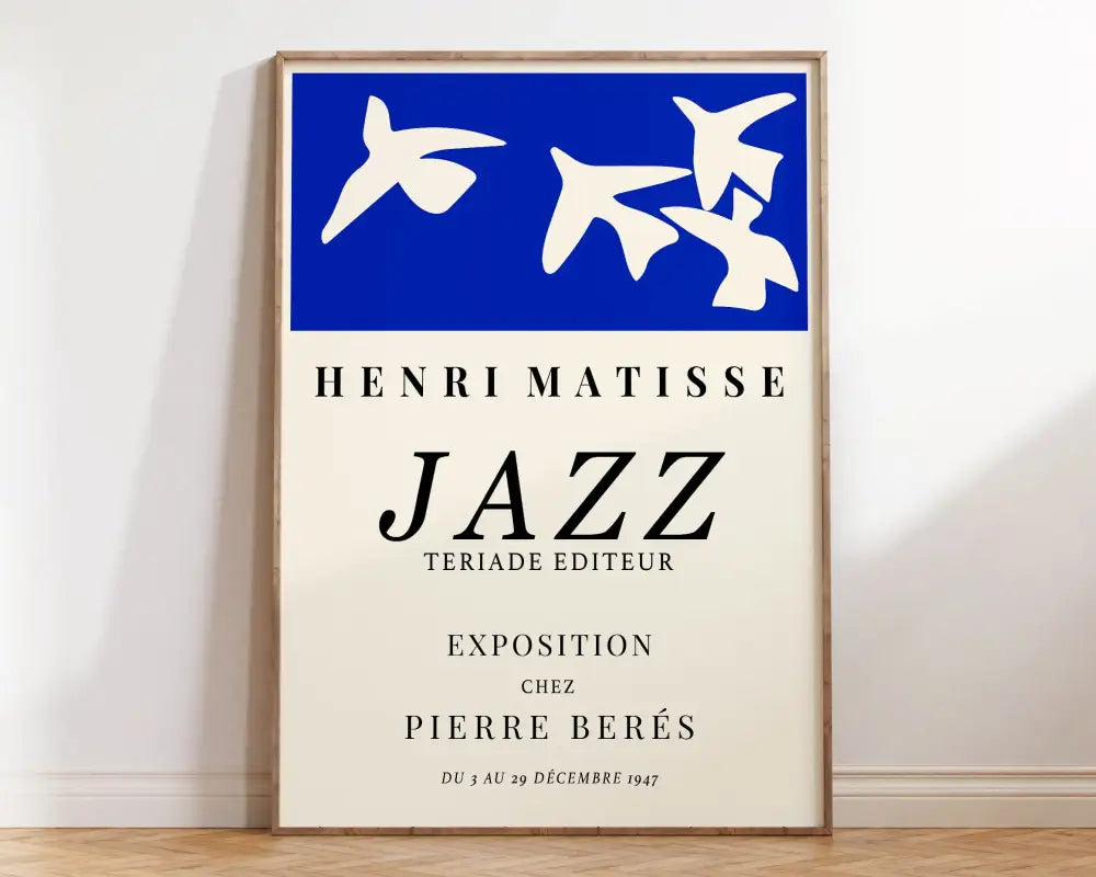 Blue and cream framed poster featuring stylized white bird silhouettes with bold black henri matisse jazz text for matisse floral art decor