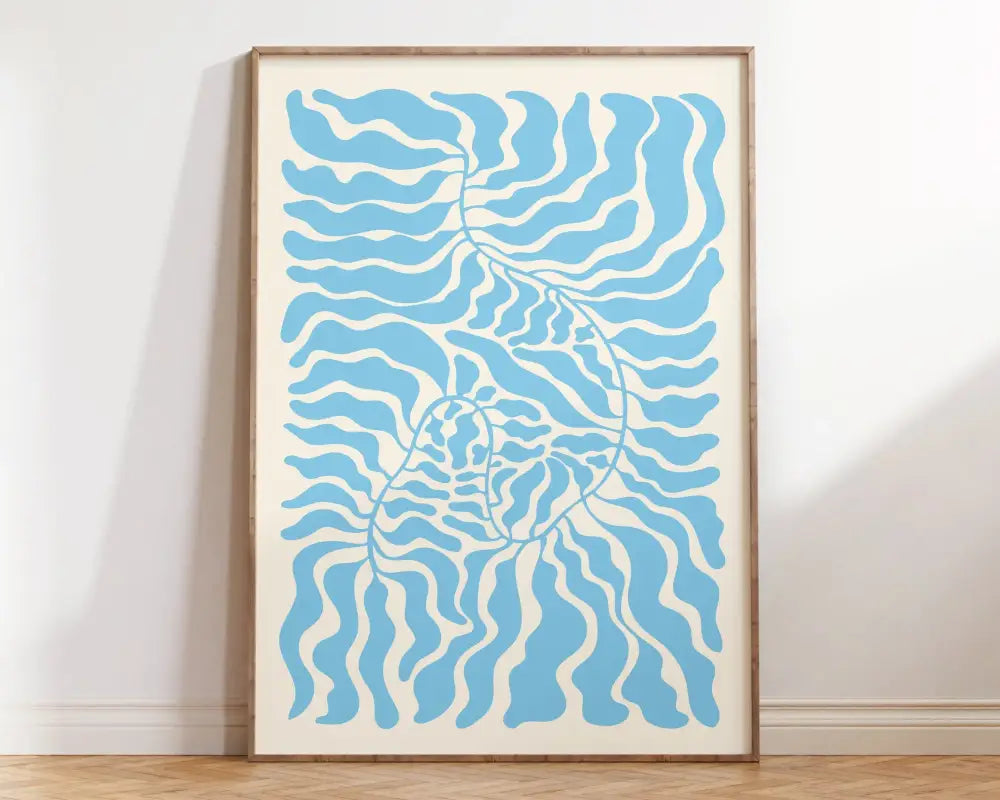 A framed abstract art print from the market matisse collection featuring flowing blue patterns on a cream background