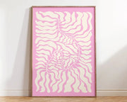 A framed DecorBites™ Matisse floral art print with flowing cream patterns on soft pink from the market Matisse collection