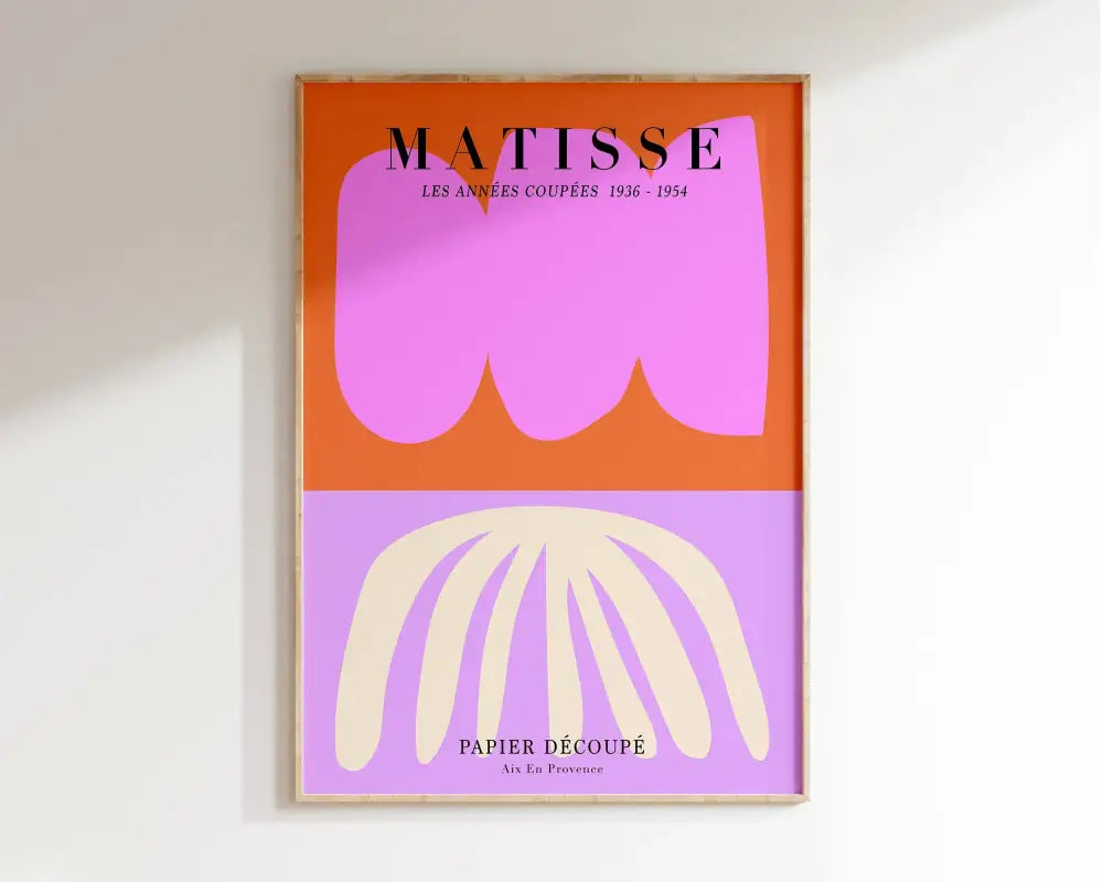 A framed poster from the DecorBites market matisse collection featuring bold orange and lavender floral art with a pink shape