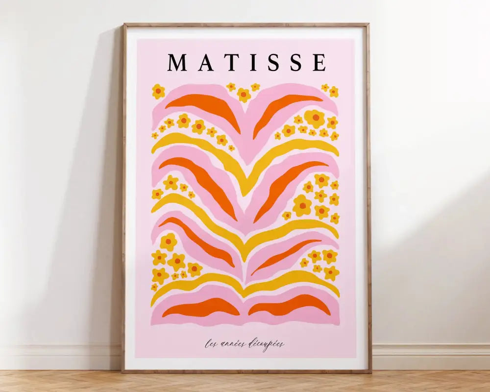 A framed art print from the market matisse collection featuring bold pink orange and yellow floral patterns on soft pink