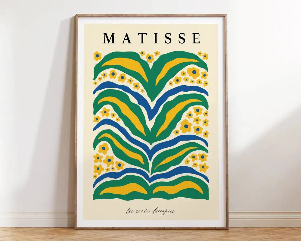 A framed poster from decorbites market matisse collection featuring bold green yellow and blue matisse floral art patterns