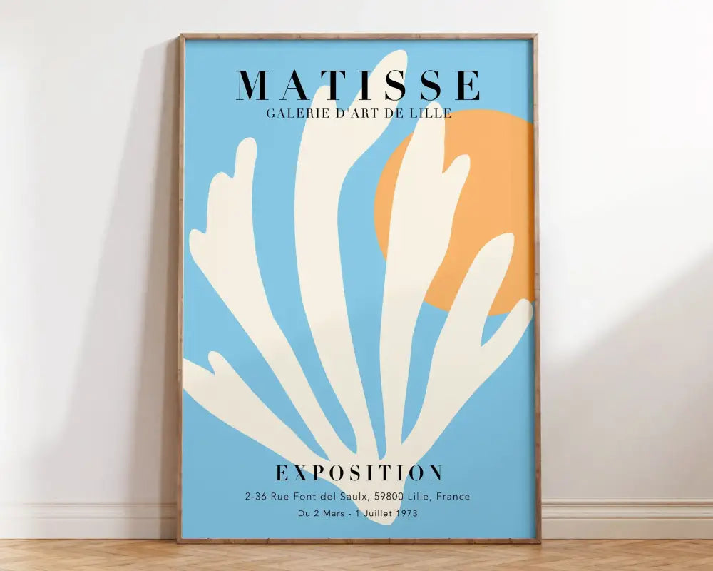 A framed poster from the market matisse collection featuring white coral and orange circle with matisse floral art text