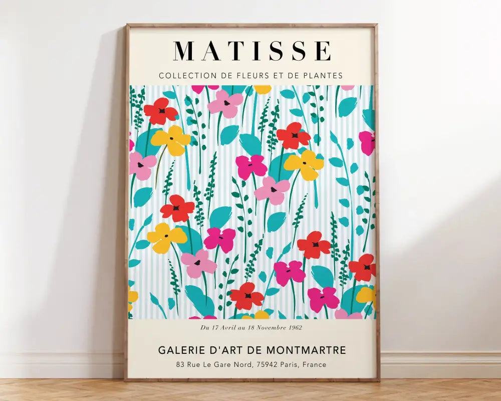 A framed DecorBites™ Matisse floral art print featuring vibrant red pink yellow and teal abstract flowers on a striped background