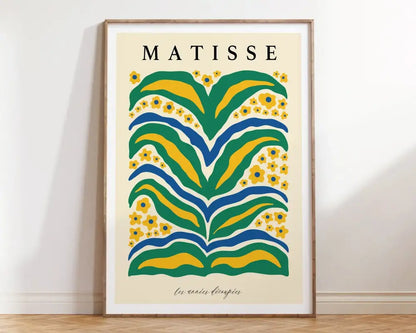 A framed DecorBites™ matisse floral art print with bold green yellow and blue abstract floral patterns and matisse text