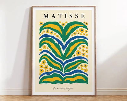 A framed decorbites matisse floral art print featuring bold green yellow and blue abstract floral patterns