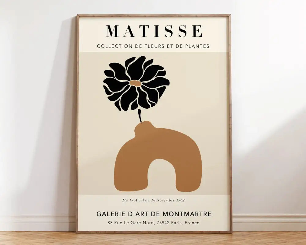 Beige-framed poster with stylized black flower and ochre vase in matisse floral art minimalist style from decorbites collection