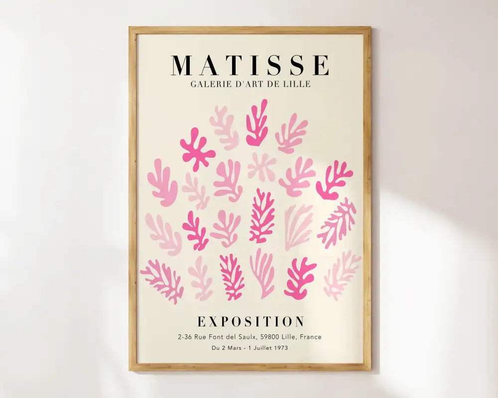 A framed cream background poster with stylized pink seaweed and black text from the decorbites matisse floral art prints collection