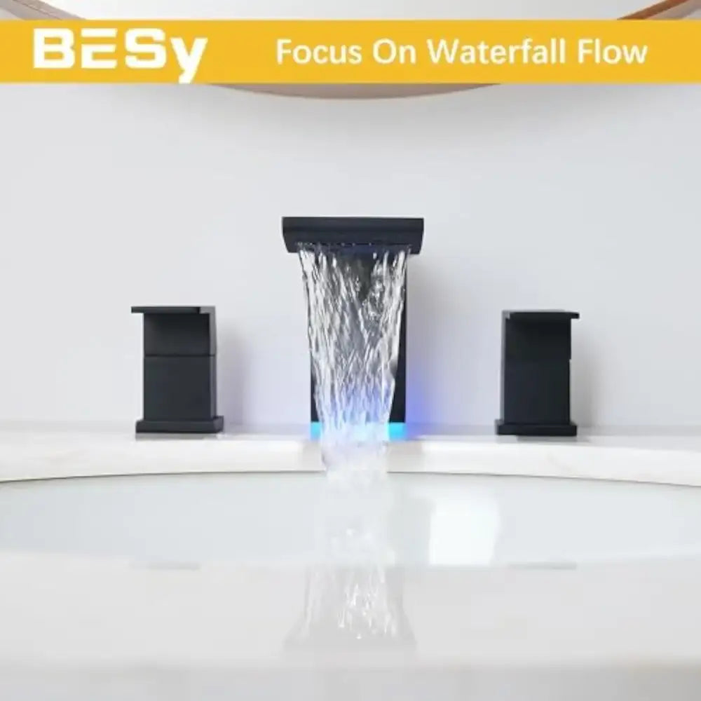 DecorBites™ matte black bathroom faucet with LED waterfall spout and illuminated blue sink faucet lighting
