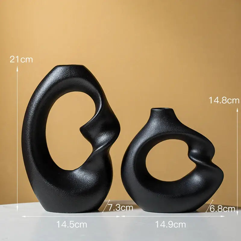 Decorbites matte vase set of two sleek black ceramic vases with abstract curves for modern home decor
