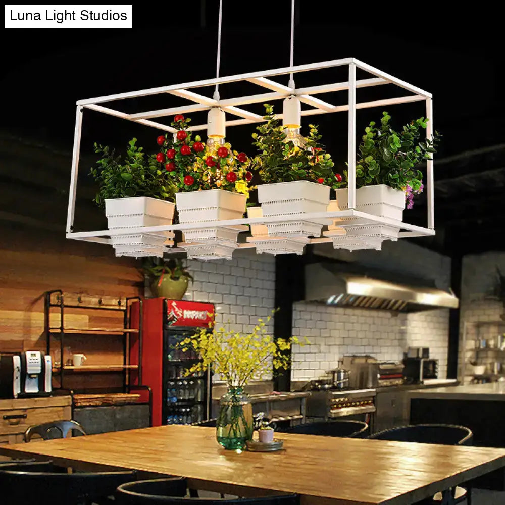 White metal-framed light fixture with integrated lighting and artificial bonsai planters fixture width suits restaurants