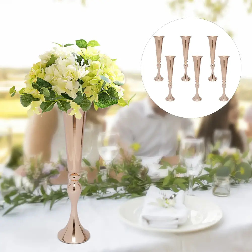 Rose gold metallic tall flower stand vase candle holder with fluted stem and white green hydrangea bouquet