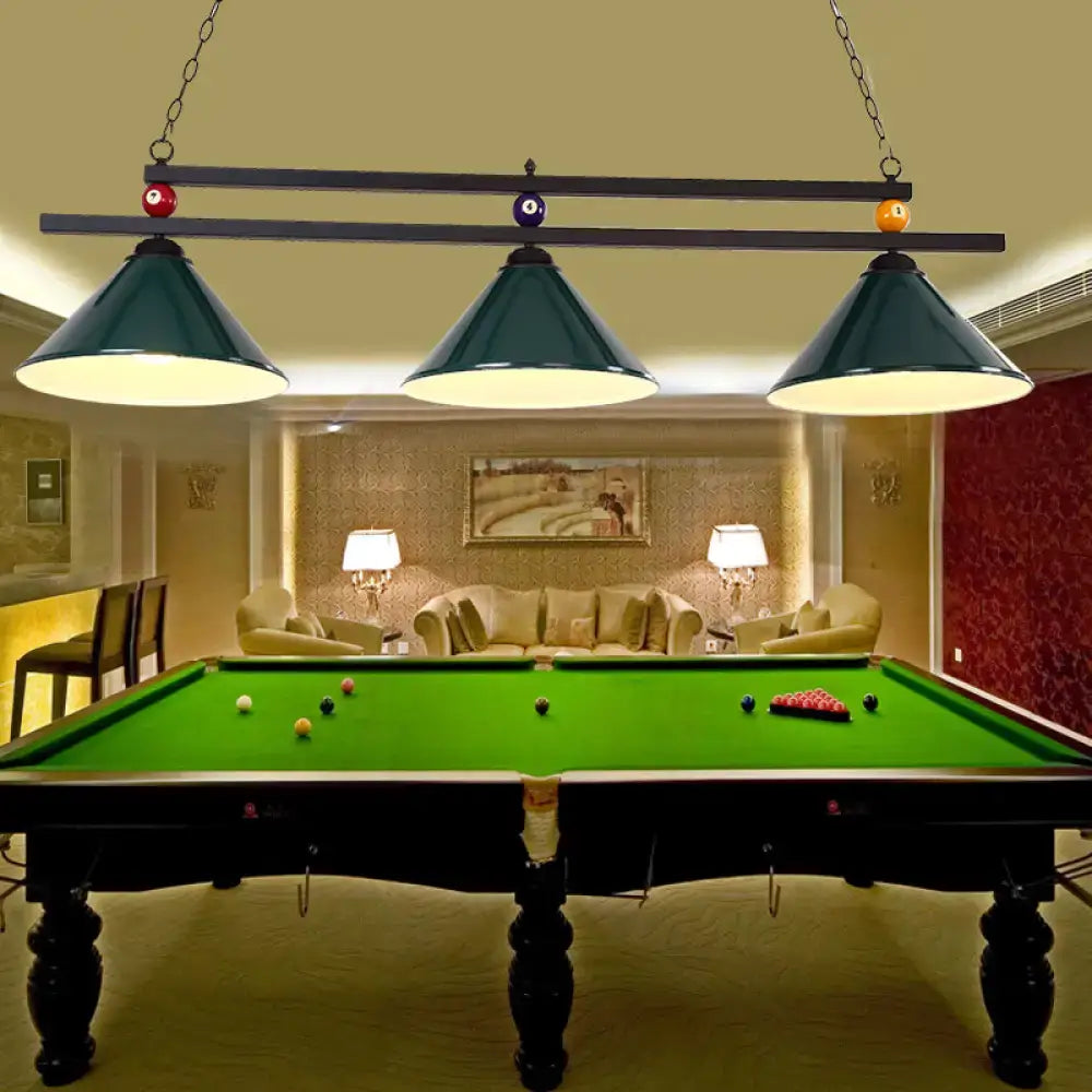 Dark green metal hanging island light with conical shades chain suspension and billiard pool ball accents industrial style