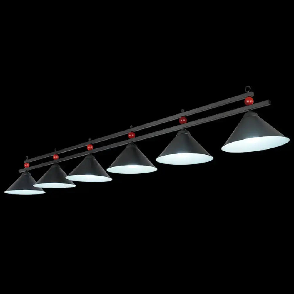 Decorbites metal hanging island light with black metal frame, five conical shades, and red spherical accents for industrial style