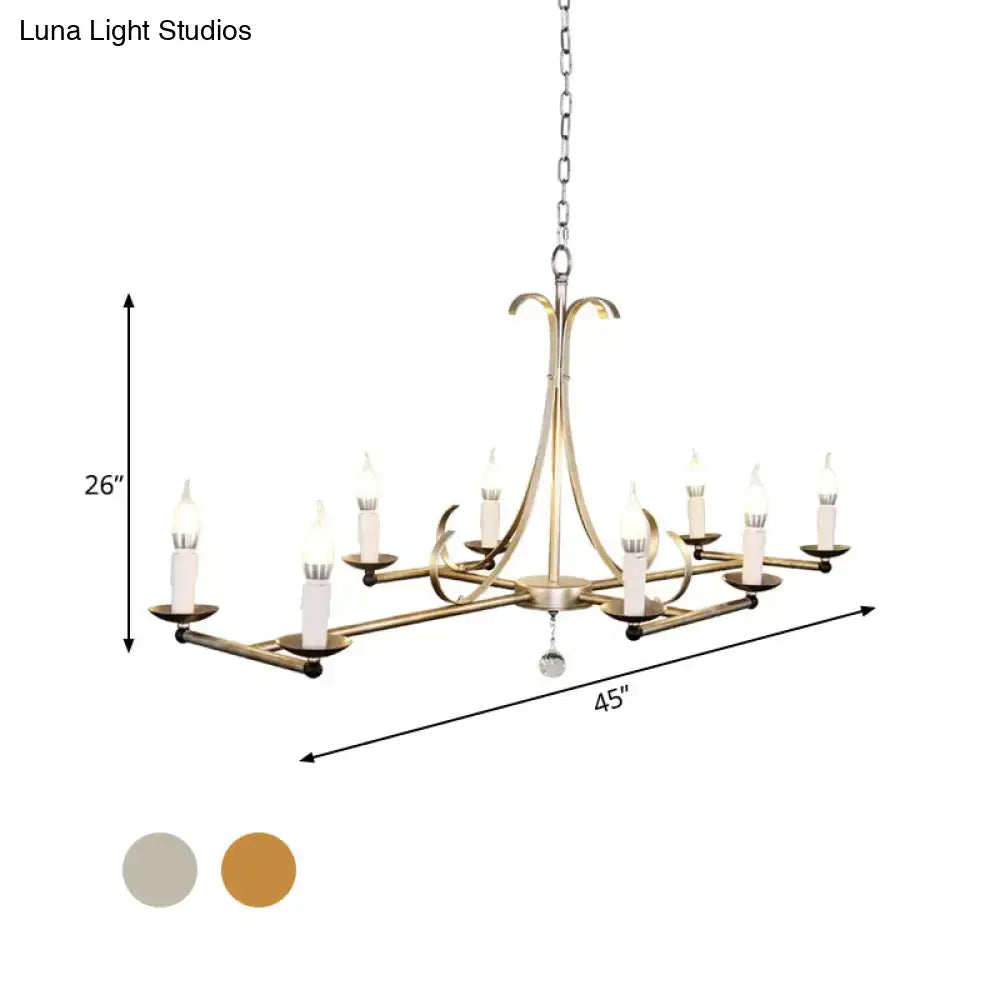 Decorbites metal island chandelier light with brass finish, traditional candle shape, eight bulbs, and crystal pendant
