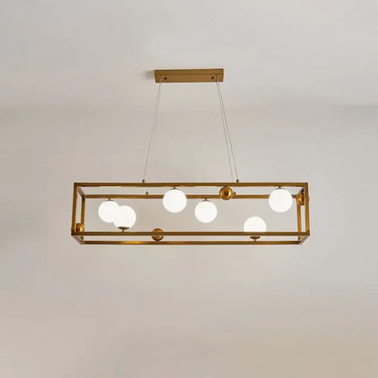 Gold-toned decorbites metal pendant light with geometric frame and milk glass shade for industrial dining rooms