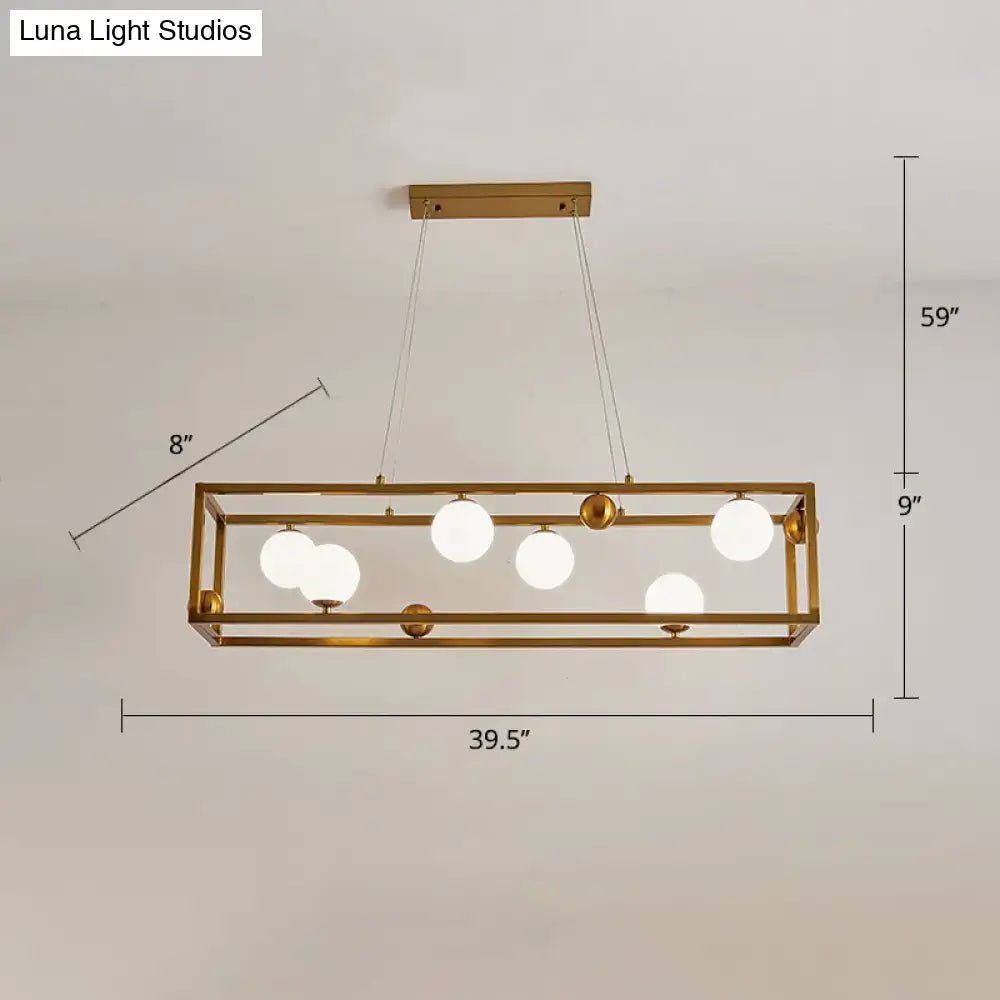 DecorBites metal pendant light with gold-toned frame and milk glass shade globes for industrial dining rooms
