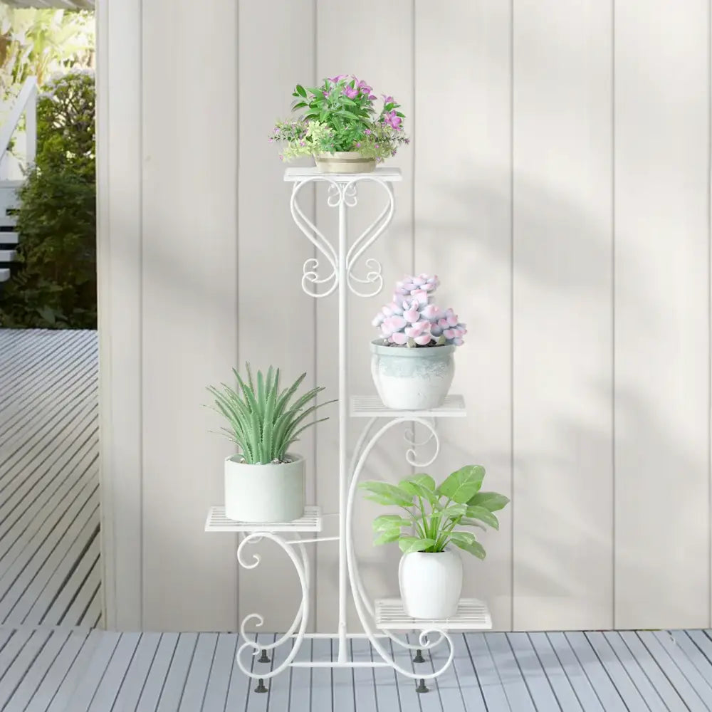 DecorBites metal plant stand in white wrought iron with ornate scrollwork and four tiered shelves for flower pots